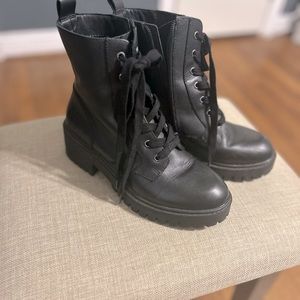 Black combat boots with a platform, worn once.